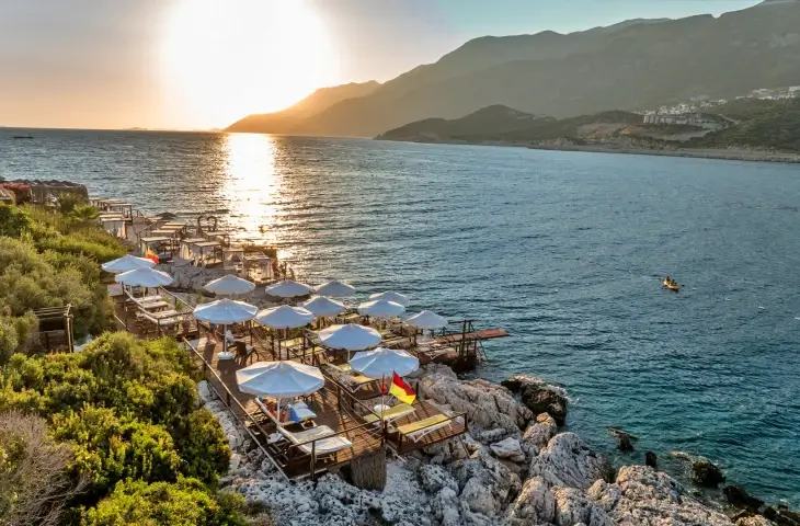Suna Sun Boutique Hotel Kaş deniz platformu ve gün batımı manzarası